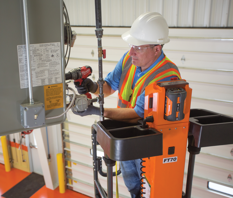 Operator completing work at height with JLG® LiftPod