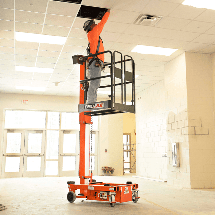 Operator working in platform of JLG® 830P