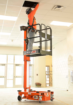 Operator hangs office decoration from JLG® 830P platform