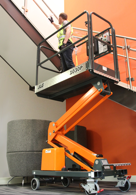 Operator works on HVAC and ductwork using JLG® 830P