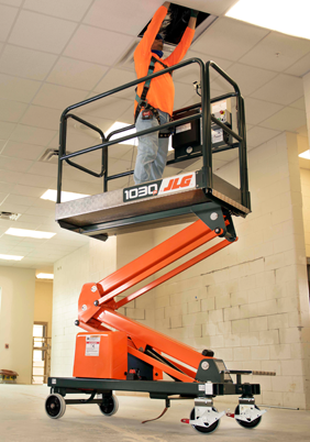 Operator completes a task at height with the JLG® 830P