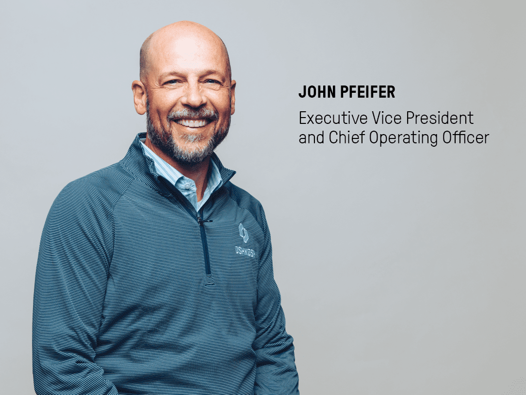 Executive Vice President and Chief Operating Officer, John Pfeifer, on a grey background