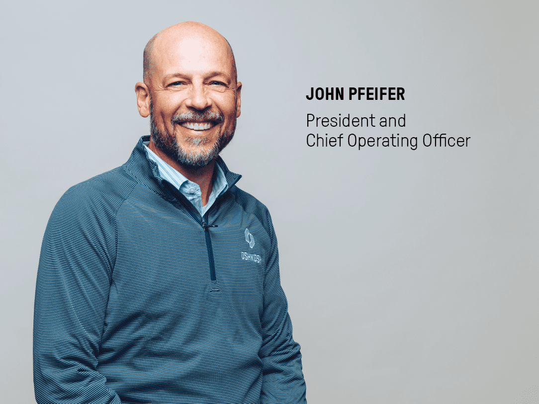 President and Chief Operating Officer, John Pfeifer, on a grey background