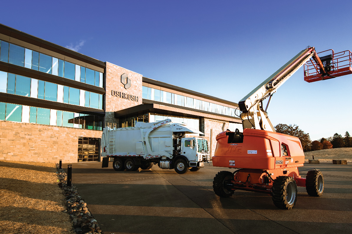 Global Headquarters of Oshkosh Corporation with refuse truck and JLG boom lift