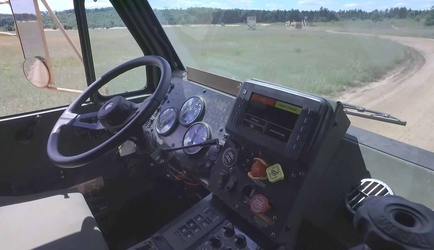 Inside the Leader Follower Program vehicle in action with no operator