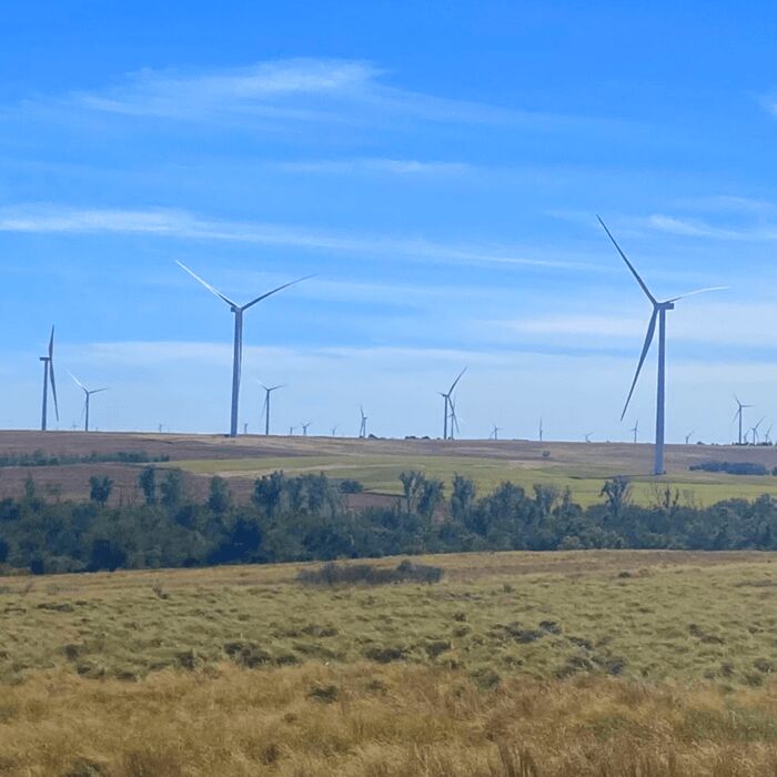 Wind farm windmills on a sunny day